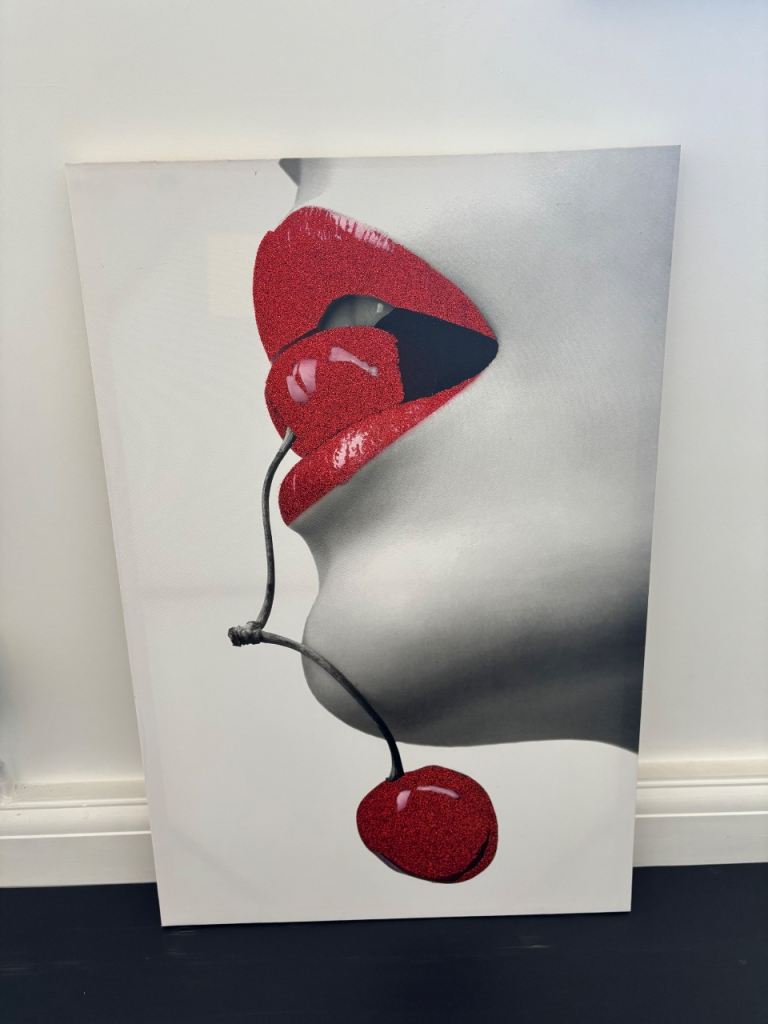 Canvas painting with red glitter lips and cherry