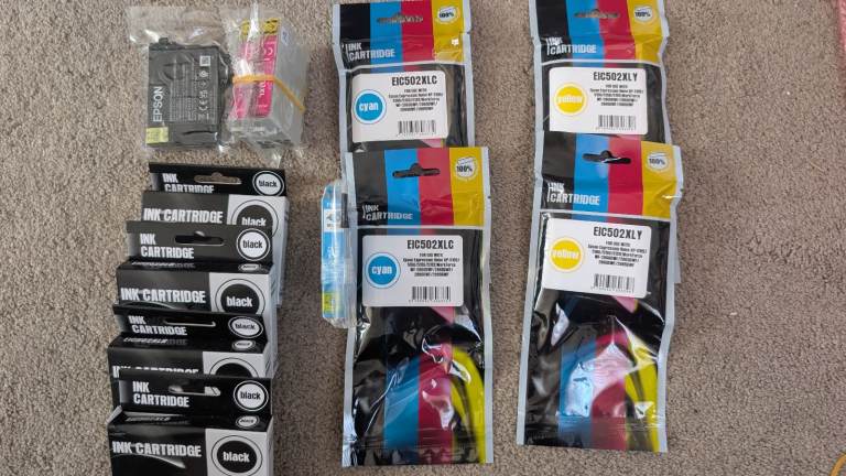 Assorted new ink cartridges for various Epson printers 