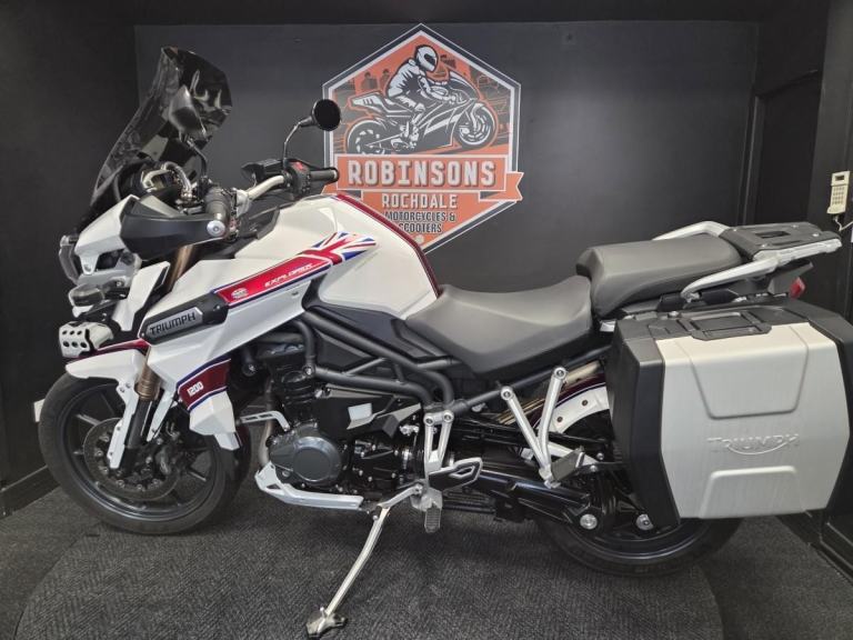 2013 Triumph Tiger Explorer 1215 in white with luggage.