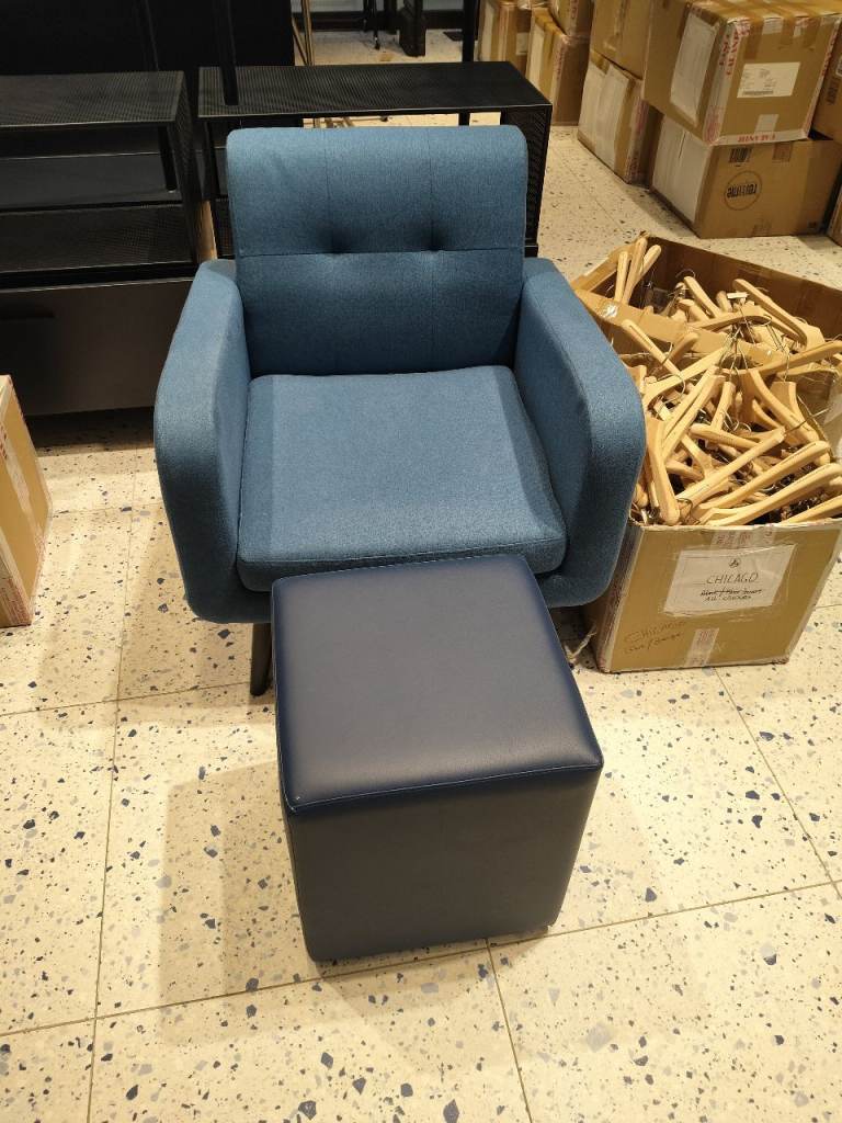 Arm chair with stool