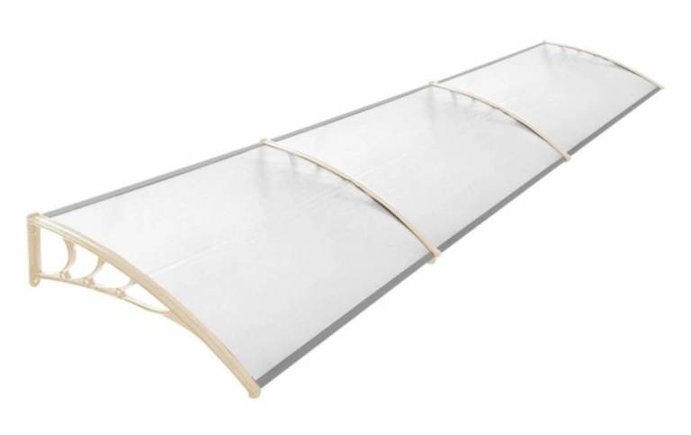 A new still boxed flat packed cream and clear plastic 3 panal over door canopy .