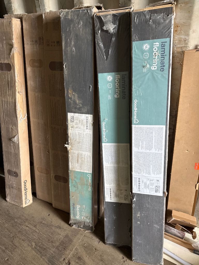 Laminate flooring: Dark wood colour. 