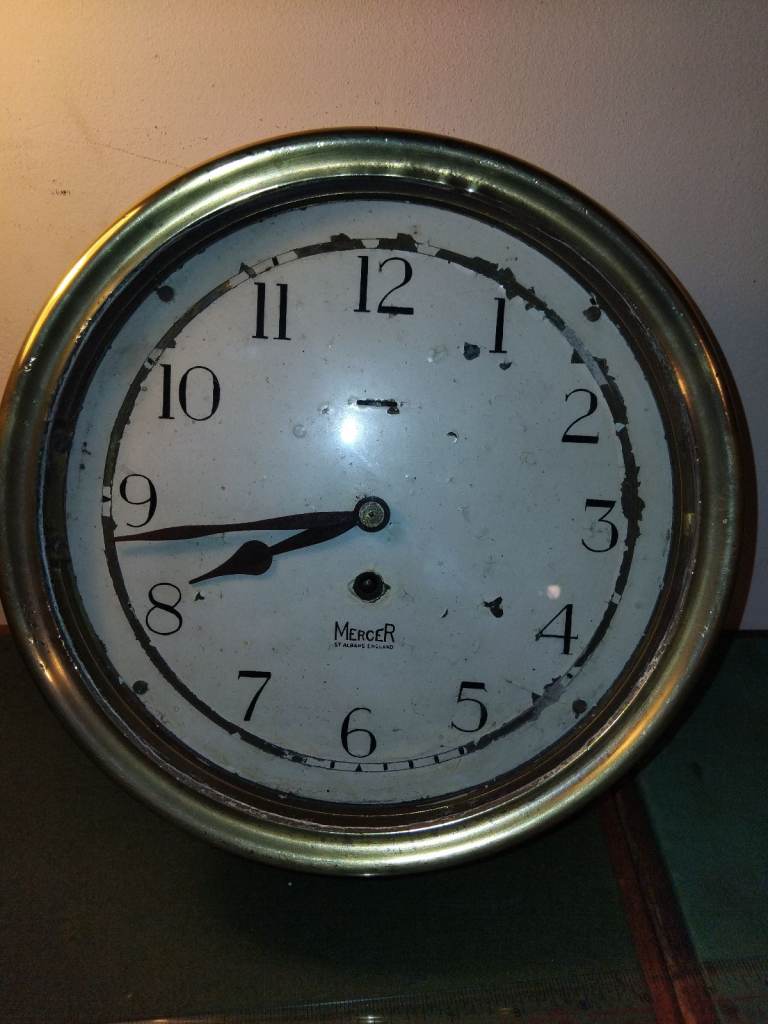 Large brass Ships clock by Mercer.