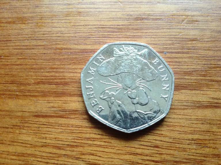 COLLECTABLE BEATRIX POTTER BENJAMIN BUNNY + BATTLE OF BRITAIN 50p COINS.