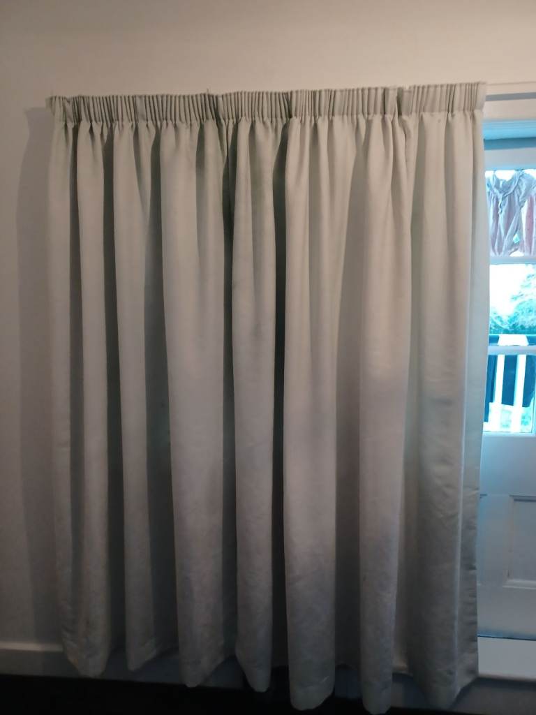 Suede curtains lined and ready to be hung