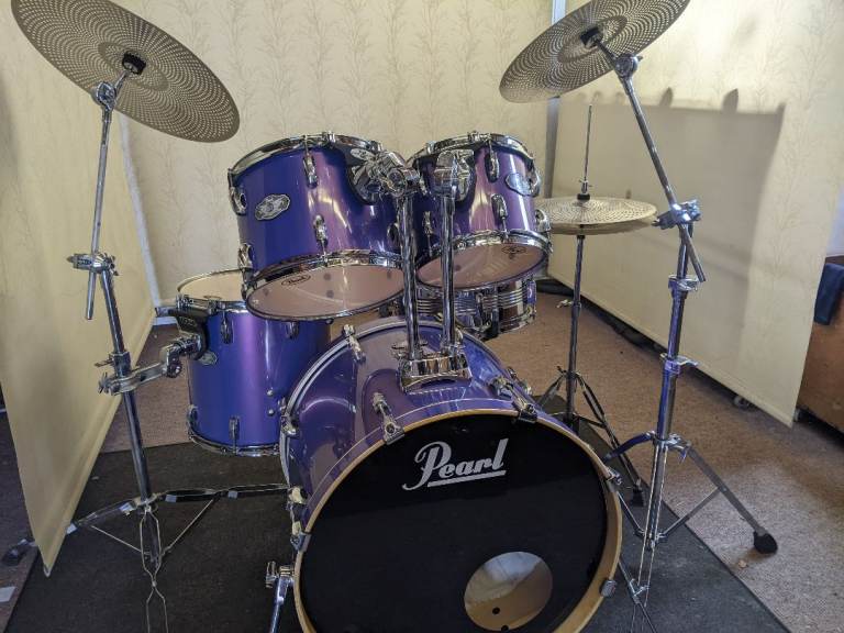 Retired drum teacher has several drum kits with upgraded cymbals.  £200-£750