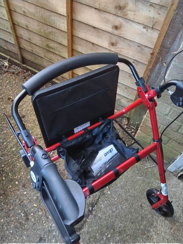 Rollator with seat twin brakes folds up in excellent condition 