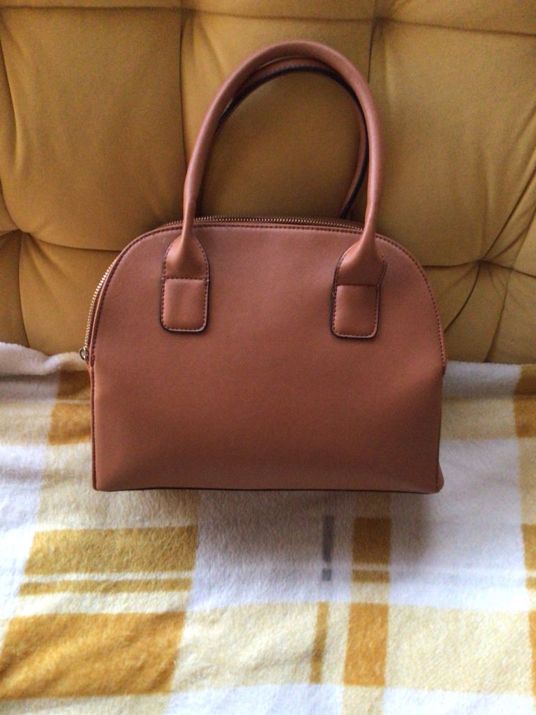 Ladies Brown medium size hand bag