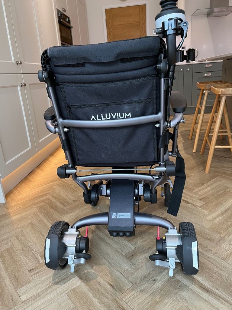 ALLUVIUM Electric Wheelchair – As Good As New, black