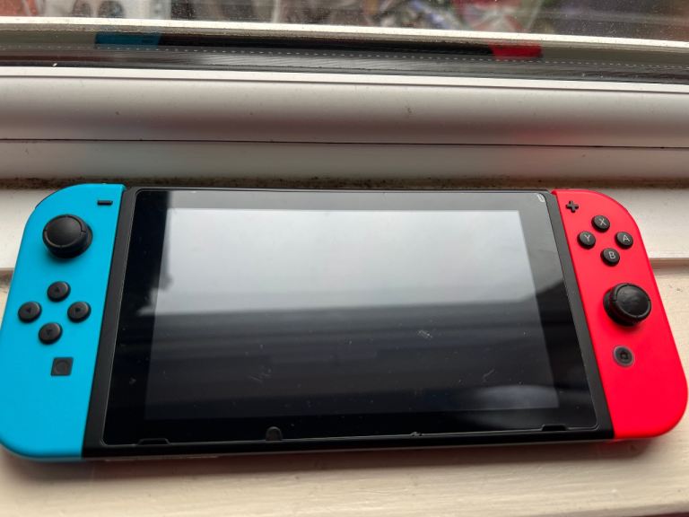  Nintendo Switch console with the original