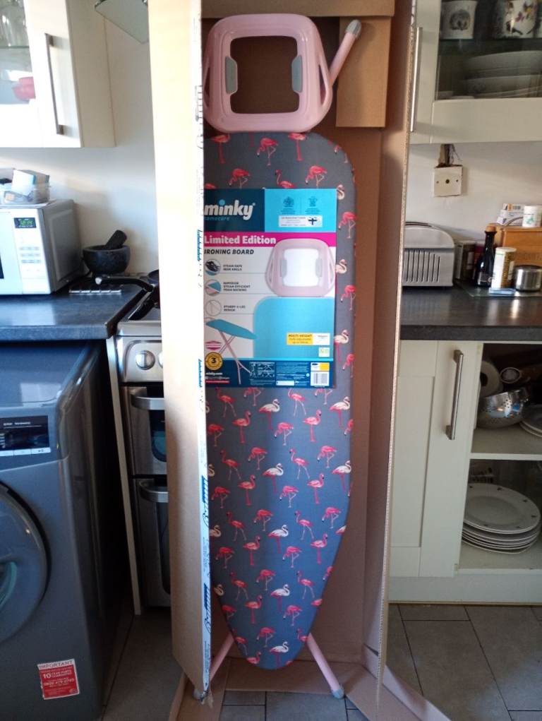 IRONING BOARD (MINKY) - 122cms x 38cms. New, boxed as delivered. No longer required.