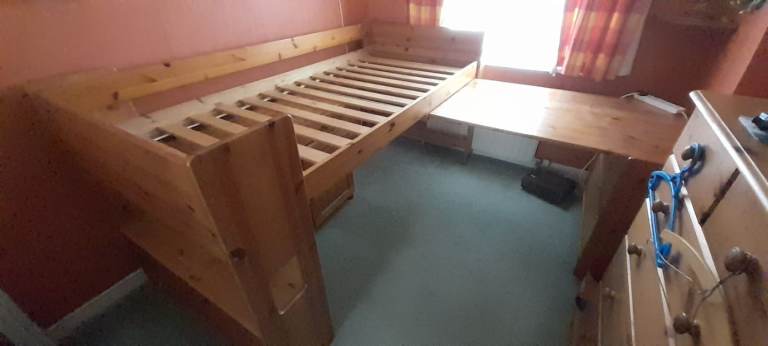 Cabin bed with slide out desk