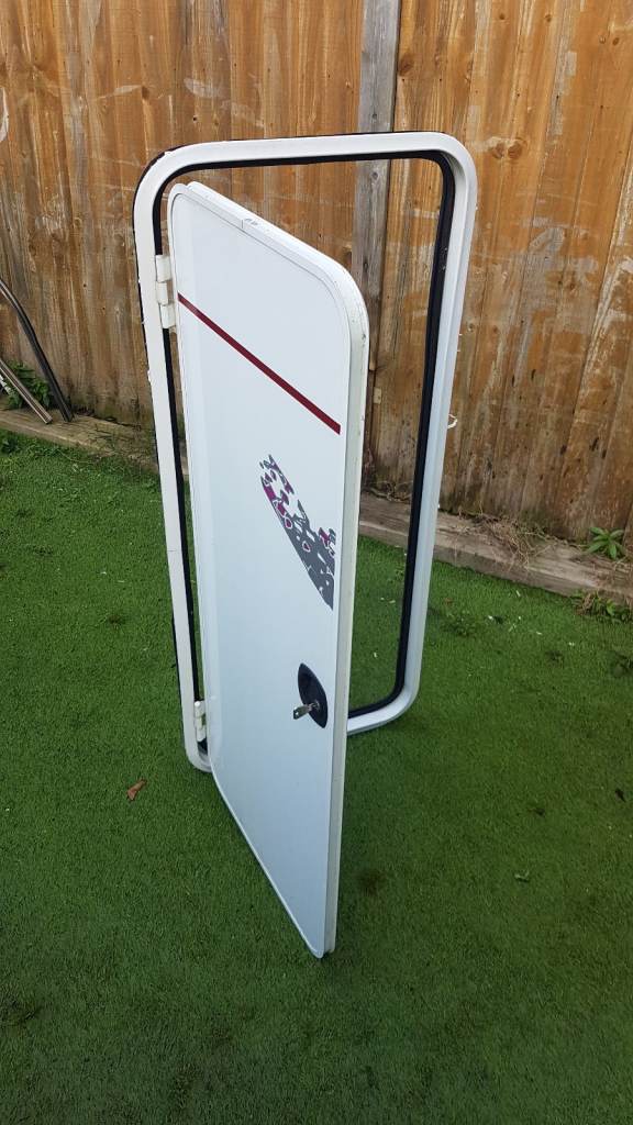 Various side doors with frames and keys for caravan camper motorhome - gas, toilet, storage.