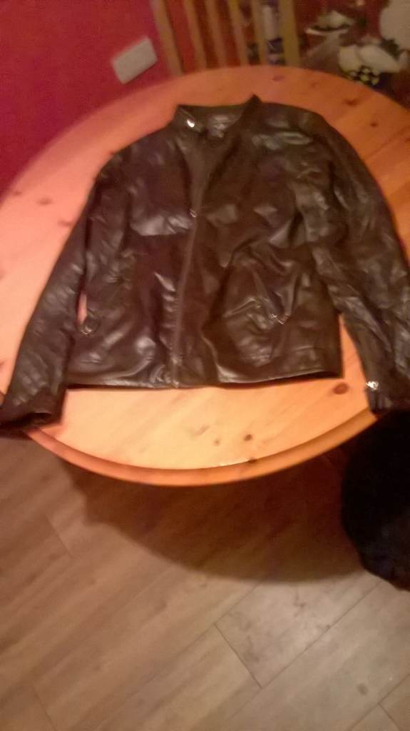 brown leather jacket with flees lining xl ( brand new no tags ) 