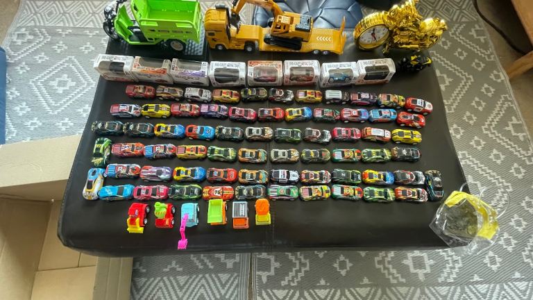 Large amount of kids toys including two motorbike clocks