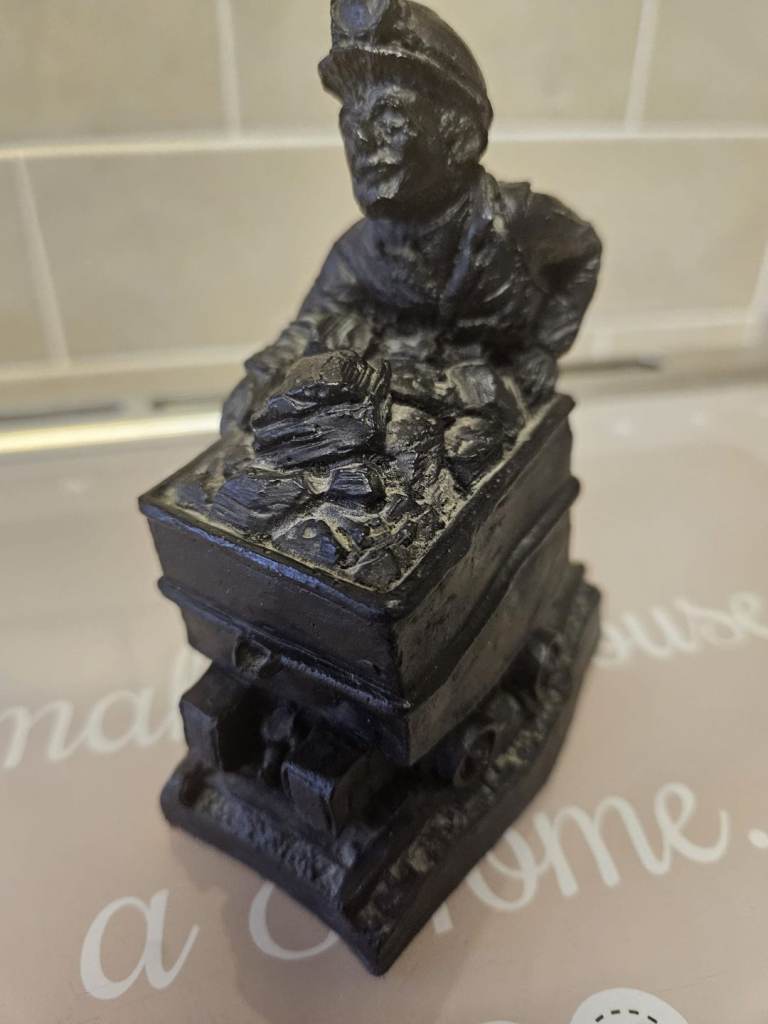 Hand crafted coal figurines 