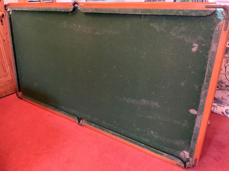 Snooker table with balls and cues