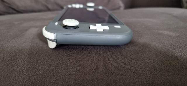 Nintendo switch lite + case + original charger , £58.00 for Sale