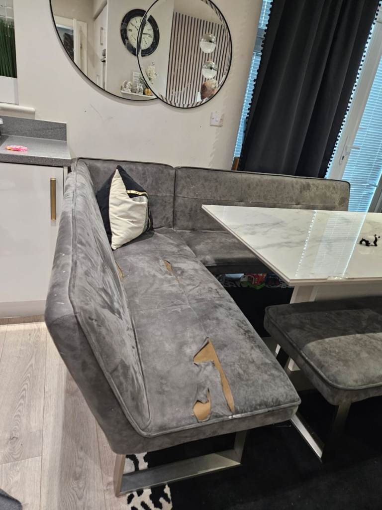 Table with corner chair, sofa and bench