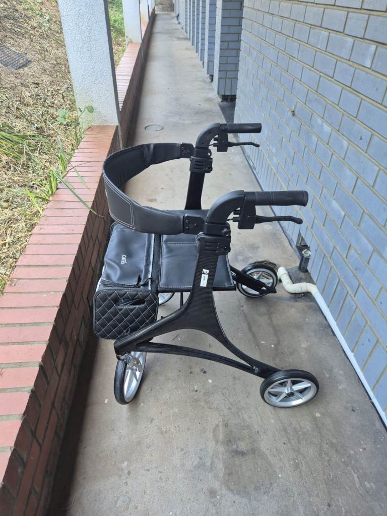 Black Mobility Rollator with Seat and Bag – Good Condition
