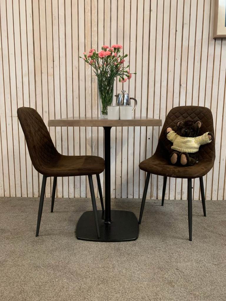 Bistro Dining Table with two Chairs, featuring Square Bown Faux-Suede Seats .