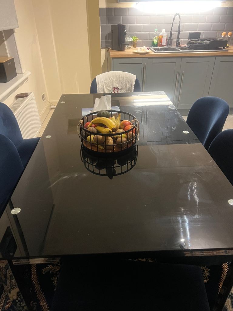Black glass dining table