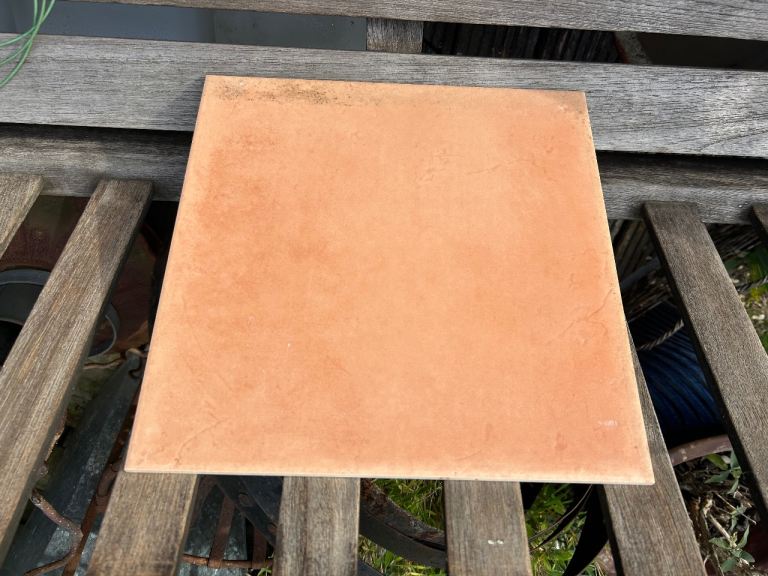 21 terracotta colour floor tiles (free)
