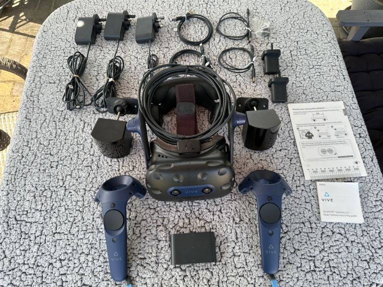 HTC Vive Pro 2 Virtual Reality System with Controllers and Base Stations