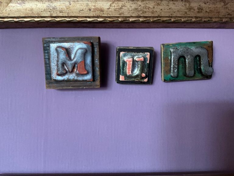 A Vintage set of Ceramic and Wooden Printing Letters /  Blocks MUM Letters Stamps 
