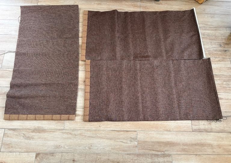 Three blackout Roman blinds