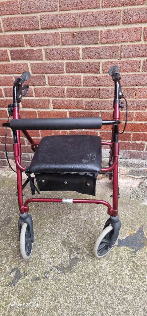 Red Mobility Walker with Seat and Storage Bag, Good Condition