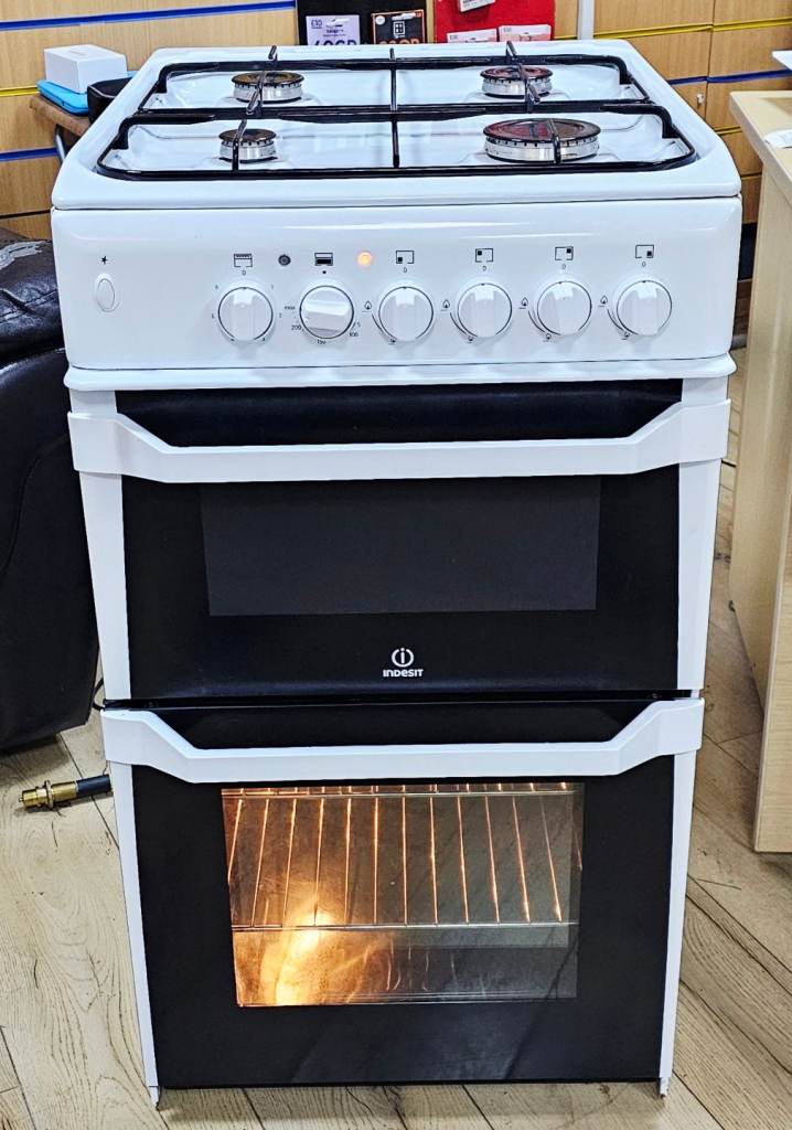 50cm wide Indesit Dual Fuel Double Electric Ovens/4 Gas Hobbs. 