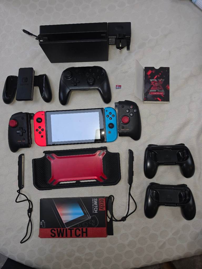 Nintendo Switch Bundle – 512GB, Pro Controller, Extra Controllers & Accessories (£220 ONO)