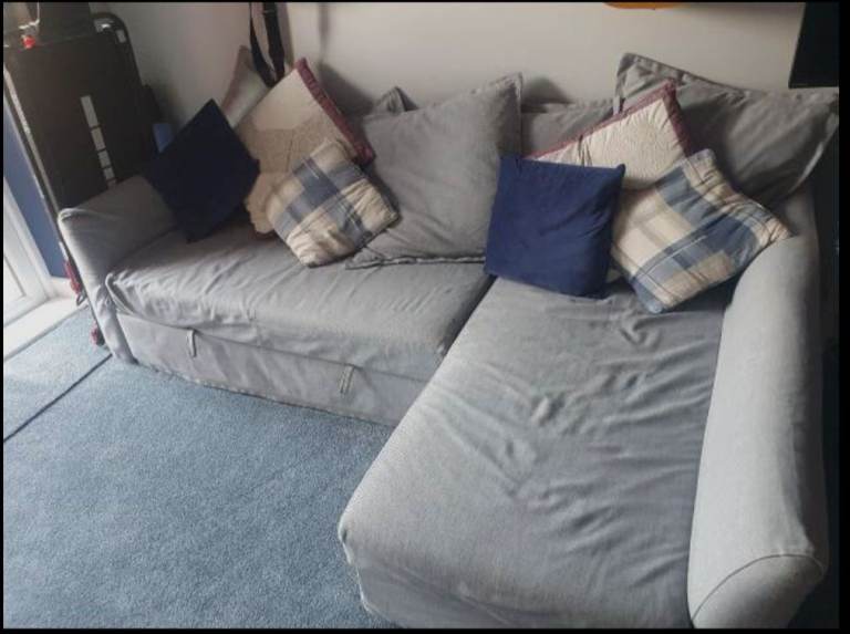 Free to collector Ikea L shaped grey sofa bed