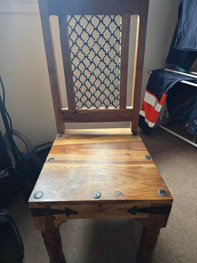 Dinning table 6 chairs soild wood. With iron bolts and nuts.