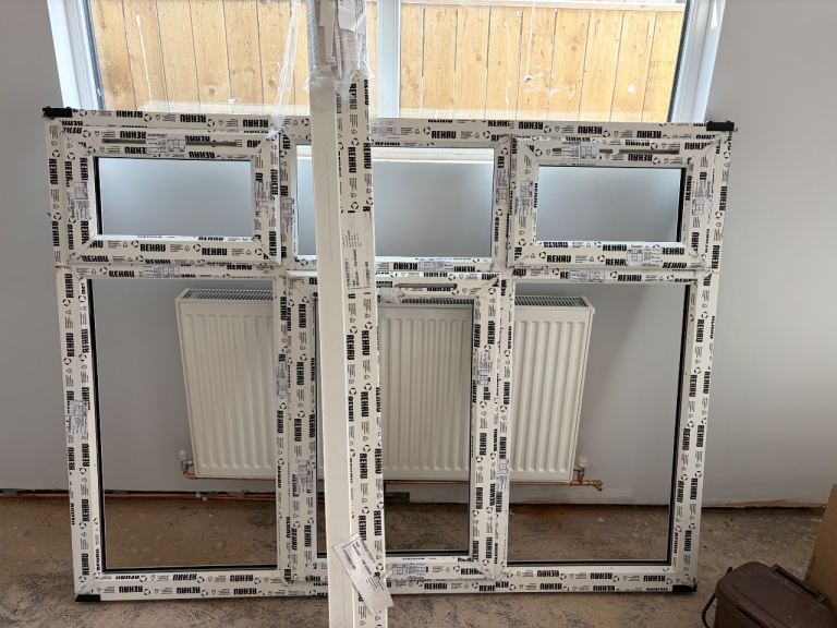 White UPVC window frame REHAU