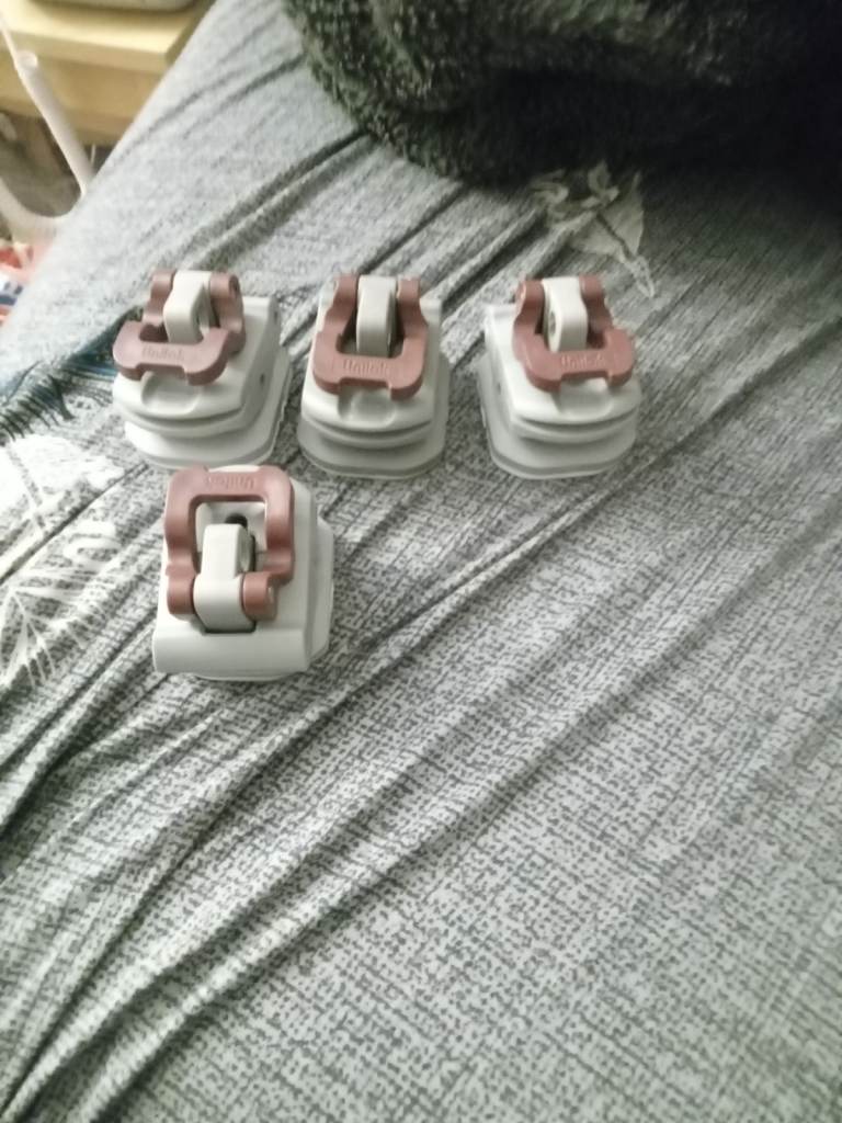 Caravan awning pole clamp