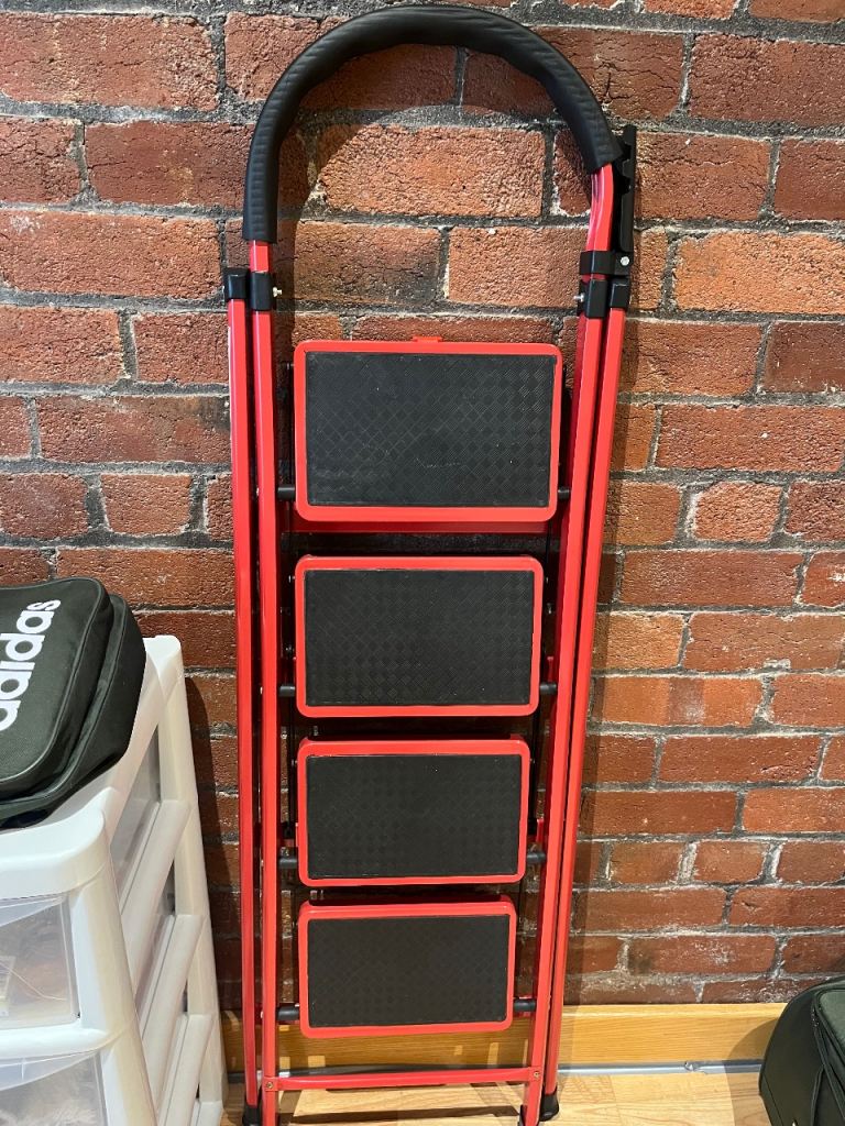 Red Metal Step Ladder - 4 Steps, brand new