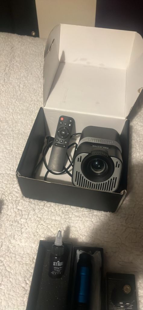 Projector and tattoo kit 