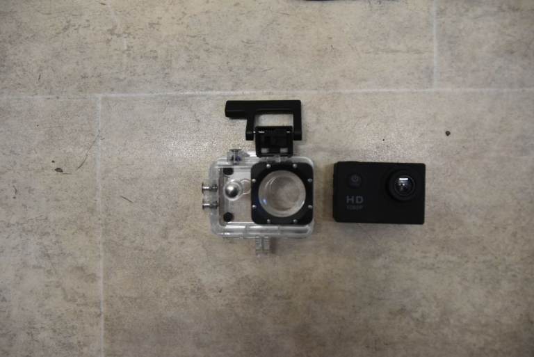 HD Action Camera with Waterproof Case – Good Condition unused.