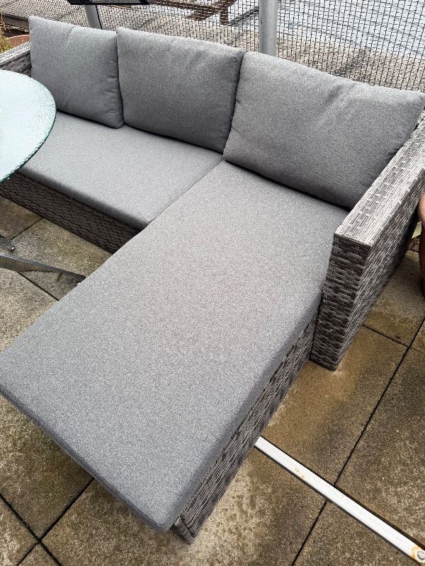 Rattan garden sofa and cushions 