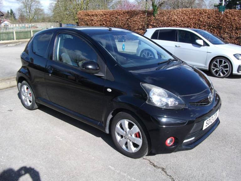 2013 Toyota Aygo, 1 litre, MOT 2027, £20 road tax, 60mpg and 98k miles.