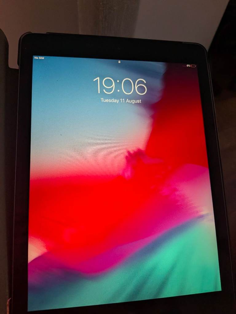 Apple iPad with Black Case – Good Condition