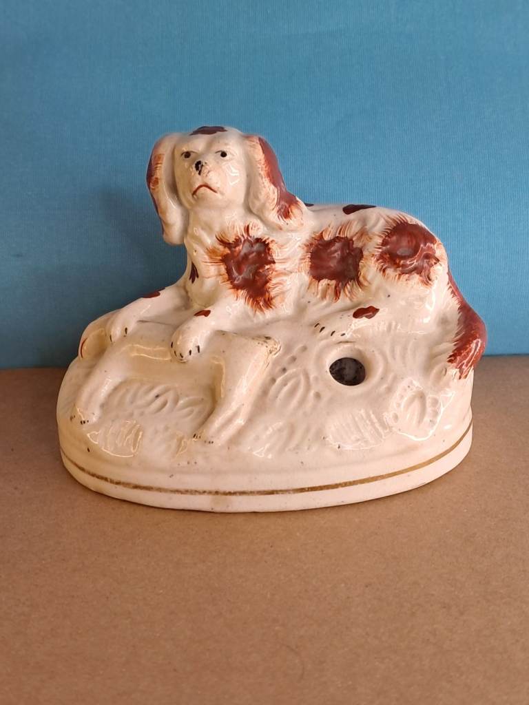 Antique Staffordshire pottery dog quill holder. As seen 