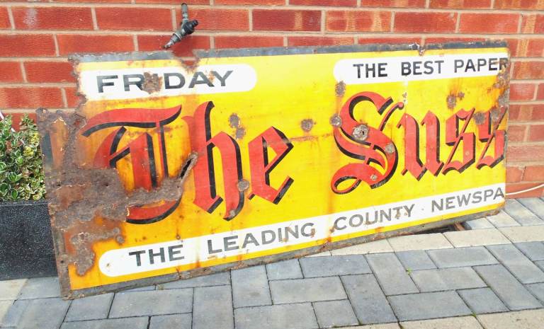 (#1125) The Sussex newspaper enamel advertising  sign  (Pick up only, Dy4 area)