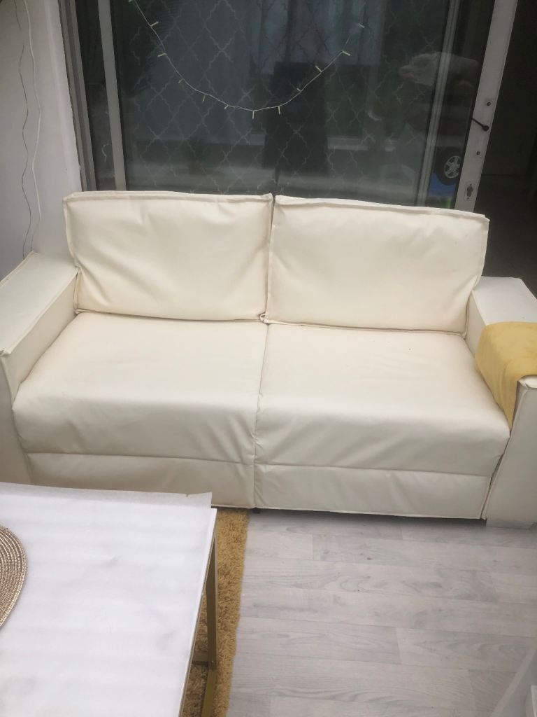 2 seater cream sofa
