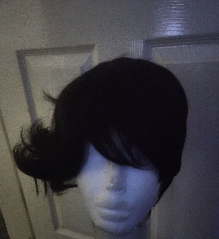 short  dark synthetic wig