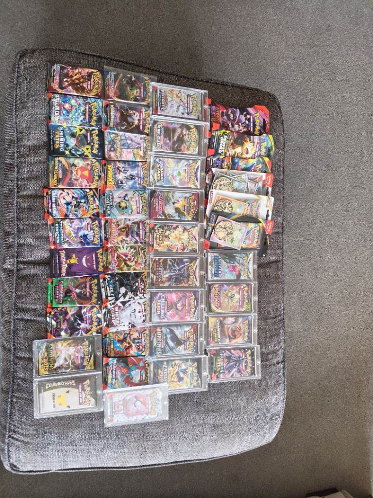 Large collection of sealed Pokémon booster packs 