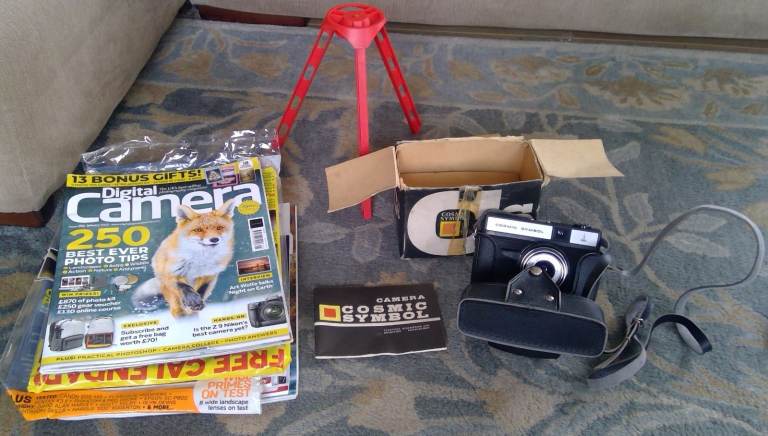 Cosmic Symbol 35mm Camera with Case and Original Manual Photography Mags and Tabletop Tripod