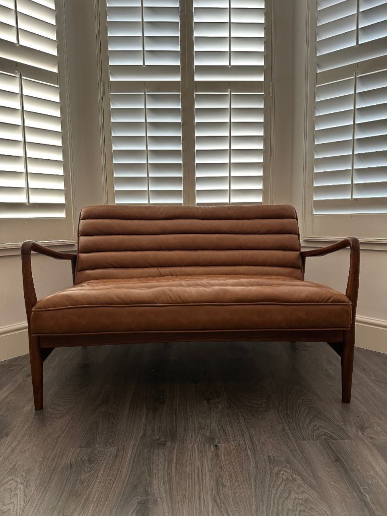 Brown 2 seater faux leather ribbed sofa